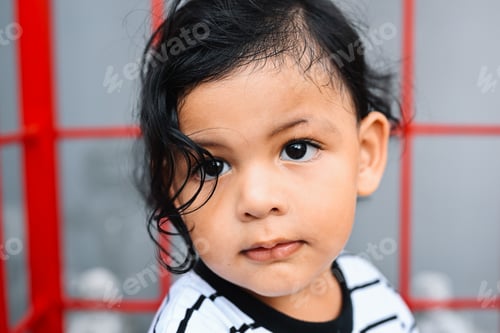 Preview: Smiling portrait of cute kid, Little boy playing at home