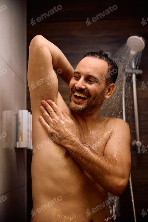 Preview: Happy man taking a bath in the bathroom.