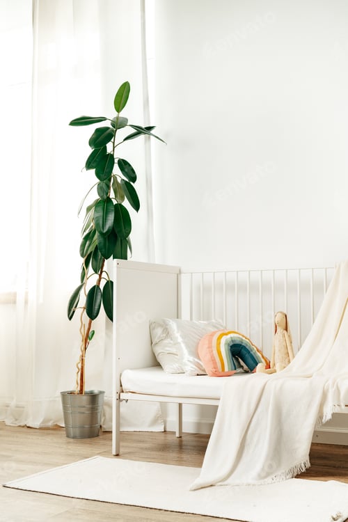 Preview: White wooden baby crib in nursery room