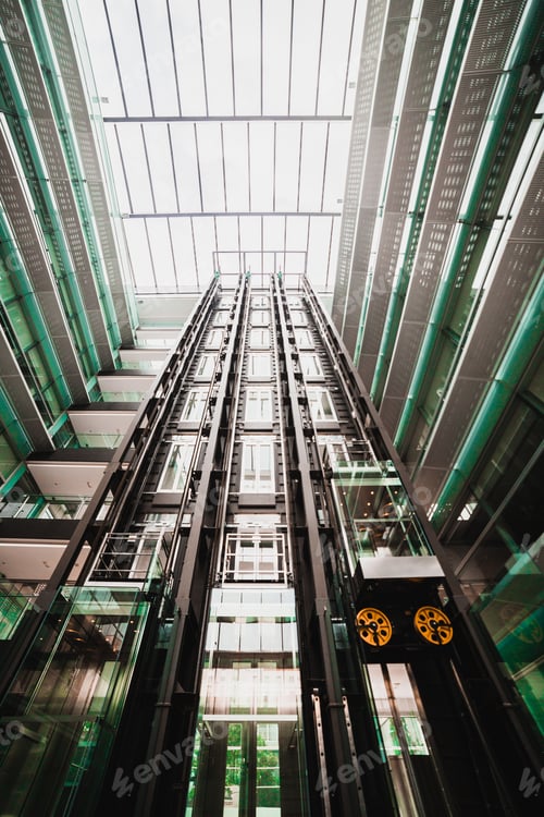 Preview: Low angle view of the inside of the building with the floors and the pipelines