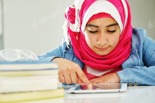 Preview: Beautiful Arabic Muslim Girl Reading On College