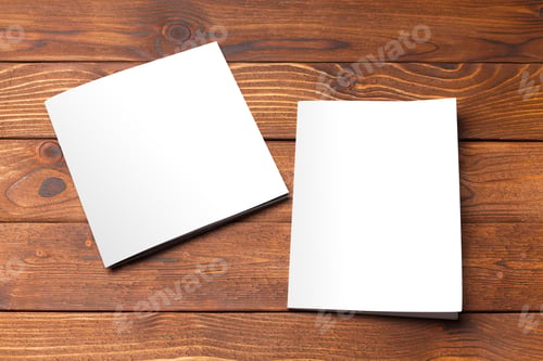 Preview: Blank book or magazine cover on wood background