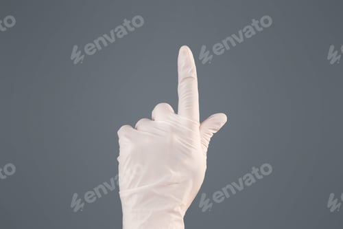 Preview: Pointing Up with a Medical Glove on Hand