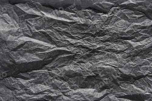 Preview: Close-up texture of gray wrinkled paper with crumpled patterns for design inspiration