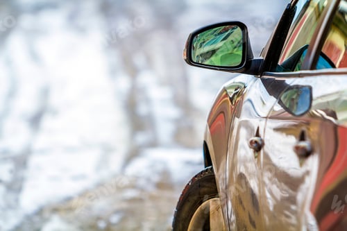 Preview: Close-up detail image of a car with side view mirror