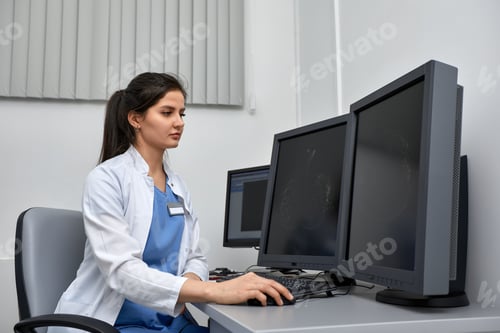 Preview: Shot of a female doctor working on medical expertise while sitting at desk in front of laptop.