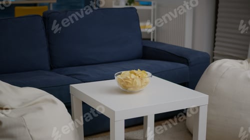 Preview: Modern empty apartament with nobody in it is ready for night party having chips bowl