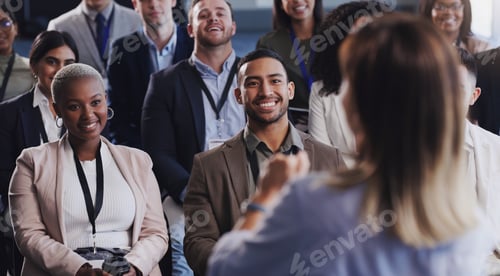 Preview: Feeling enlightened and full of ideas. Shot of a group of businesspeople attending a conference.