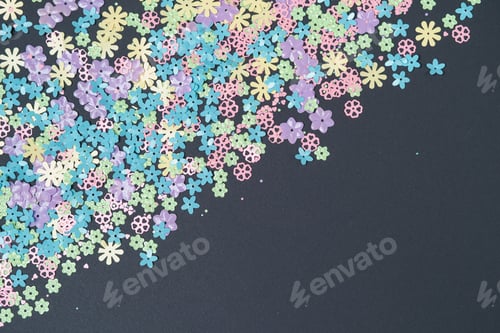 Preview: Confetti flowers on background with place for text