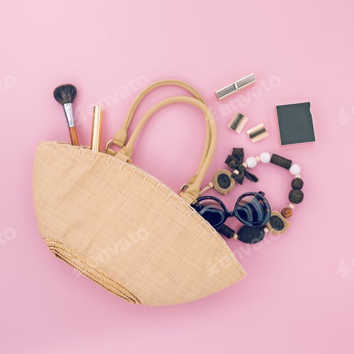 Preview: Ladies handmade bag with different accessories on pink background