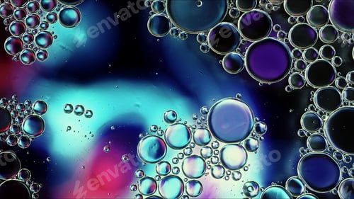 Preview: Abstract Colorful Food Oil Drops Bubbles and spheres Flowing on Water Surface