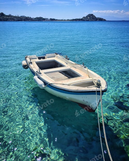 Preview: Small boat in Crystal clear water mykonos