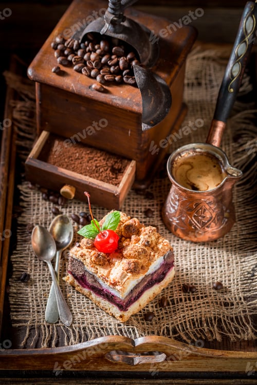 Vorschau: Closeup of cherry pie with pot boiled coffee