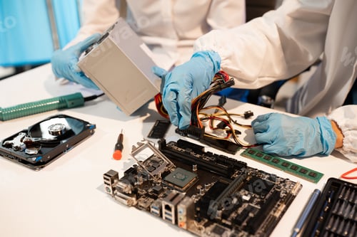 Preview: Technician measuring voltage electronic circuit board, Service after sale fix electric equipment.