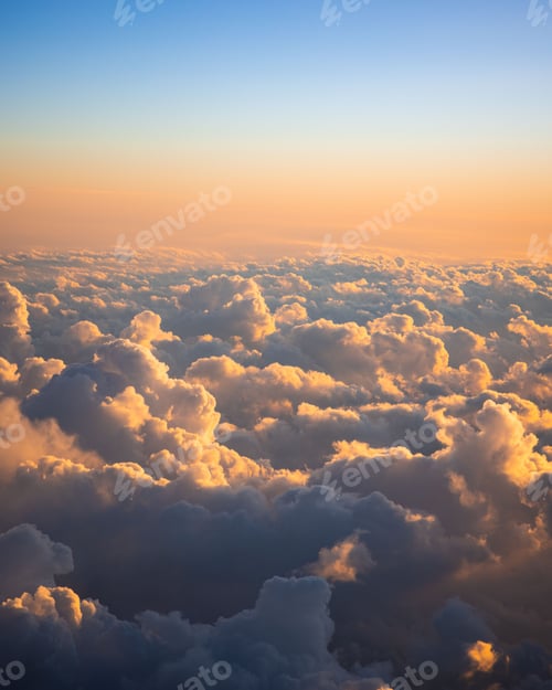 Preview: Vertical shot of beautiful clouds during the sunset - amazing for wallpapers
