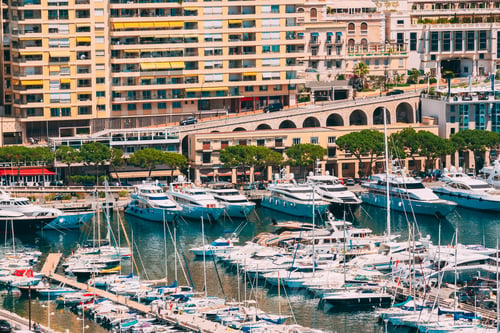 Preview: Monaco, Monte Carlo. Yachts Moored Near City Pier, Jetty In Sunn
