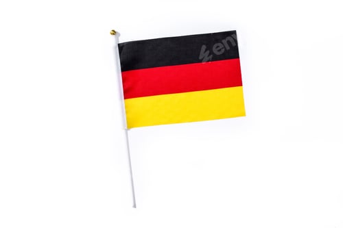 Preview: German flag waving on white background: symbol of national pride