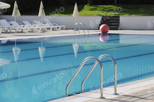 Preview: Blue Water With Reflection At Hotel Resort Swimming Pool Outdoor At Sunny Day
