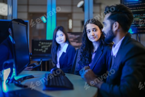 Preview: diverse team of young AI engineers in a strategy meeting.