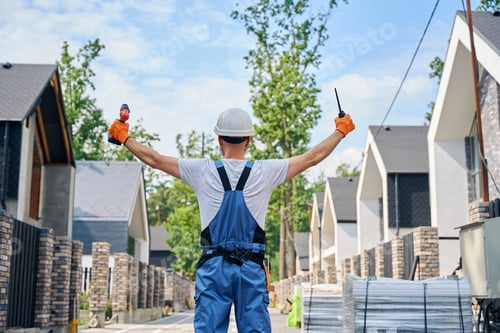 Preview: Builder with building instruments on construction site