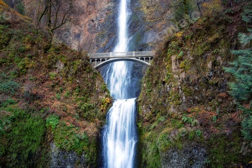 Preview: Bridge going over a river with Multnomah Falls