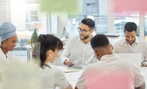 Preview: Cropped shot of a group of young diverse businesspeople having a meeting in the boardroom