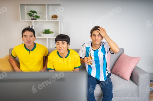 Preview: Friends watching a soccer game on the TV