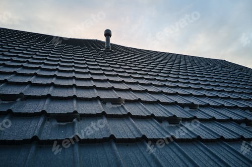 Preview: Snow guard for safety in winter on house roof top covered with steel shingles