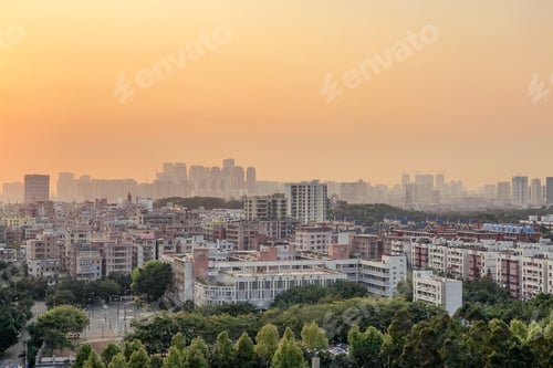 Preview: Panoramic aerial shot of the cityscape and the colorful skyline at sunset aerial