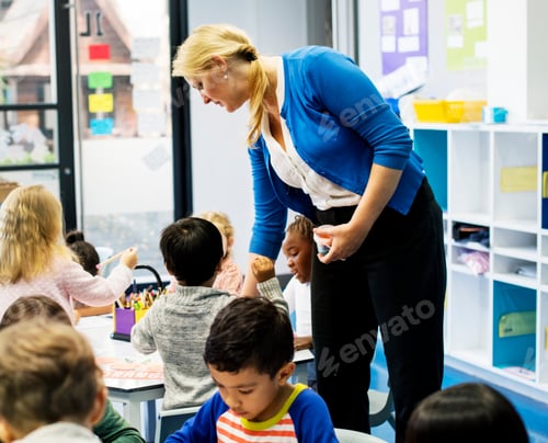 Preview: Group of diverse students coloring workbook in class