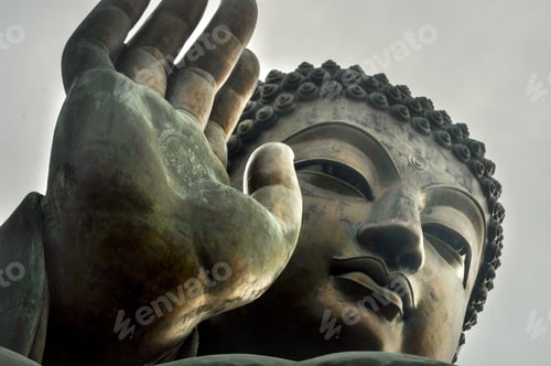 Preview: Low angle shot of the Tian Tan Buddha monument under the sunlight at daytime in Hong Kong