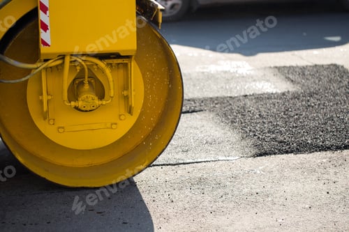 Preview: Road roller compacting asphalt