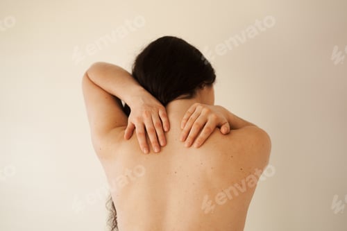 Preview: Cervical spine osteochondrosis. Young female feels neck and spine nerve pain