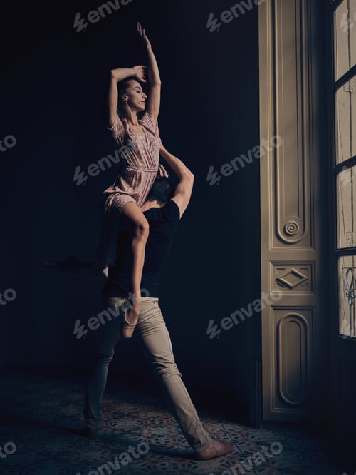 Preview: Couple dancing ballet in classic room