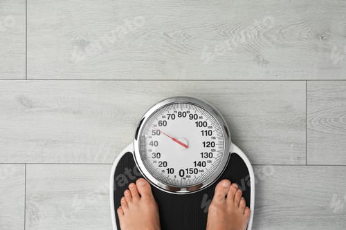 Preview: Woman standing on scales indoors, top view with space for text. Overweight problem