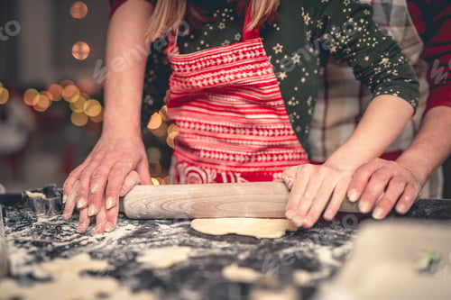Preview: Mother and daughter rolling gingerbread dough