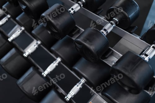 Preview: Many dumbbells on a rack in the gym