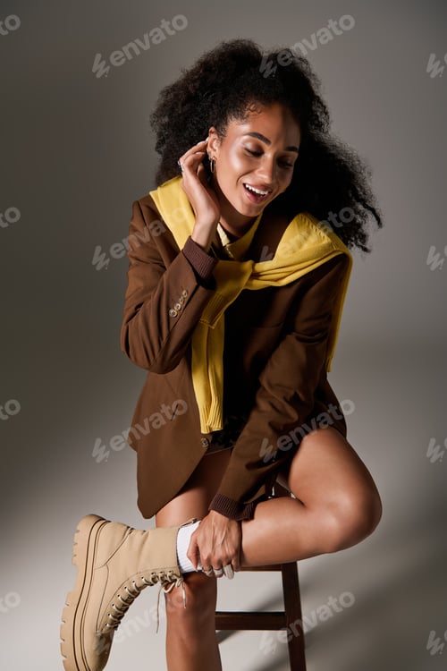 Preview: Elegant autumn style showcased by a confident black woman in a trendy outfit
