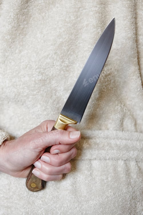 Preview: Killer woman with a knife. Violence aggression. Criminal murderer. Assassin