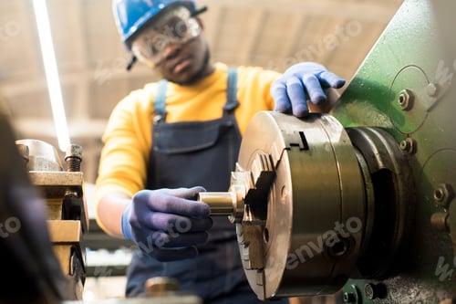 Preview: Machine Operator Adjusting Equipment