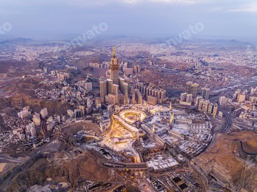 Preview: Aerial view of the Kaaba and Abraj Al-Bait Clock Tower in Mecca at sunrise