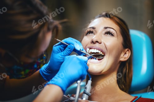 Preview: Woman Receiving Dental Checkup at Dentist Office