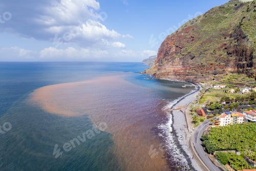 Preview: Aerial view of small farming village with banana plantation at Madeira Atlantic Ocean coast
