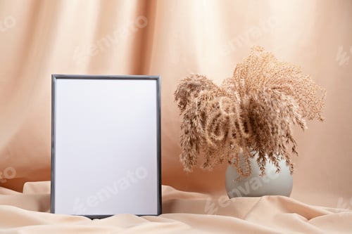 Preview: Mockup with empty frame dried grass over beige fabric background