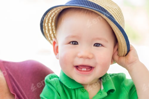 Preview: Portrait of A Happy Mixed Race Chinese and Caucasian Baby Boy Wearing His Hat