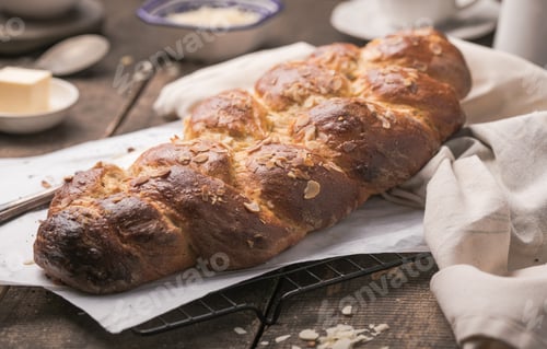 Preview: Tsoureki braid, greek easter sweet bread, on wood