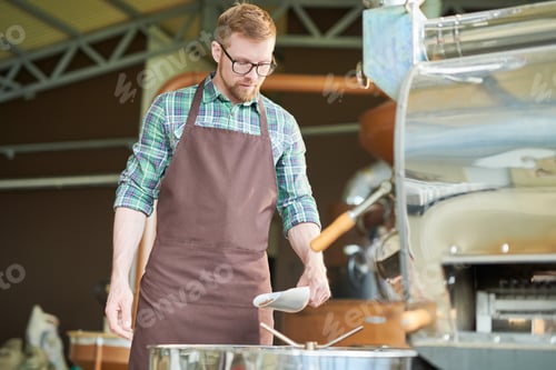 Preview: Modern Young Man Roasting Coffee