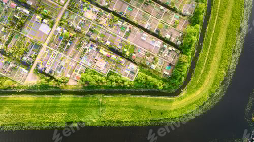 Preview: Aerial view of vegetable gardens. Netherlands. Canals with water for agriculture.