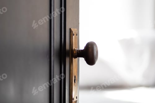 Preview: Partially open door with original vintage knob and hardware