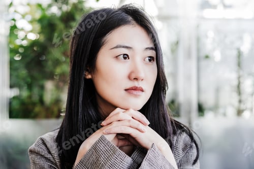 Preview: portrait of confident professional chinese entrepreneur woman in cafeteria. Technology, lifestyle